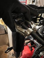 using a puller to get the shocks off.jpg using a puller to get the shocks off.jpg